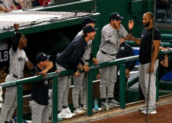 Ryan McMahon and the dugout react to Jazz Chisholm's go-head homer in the 9th in the Yankees' 5-3 win over the Nationals in Washington, D.C., July 10, 2026.